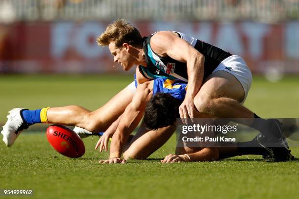 Josh Kennedy of the Eagles and Tom Jonas of the Power contest for the ball during the round seven AFL match between the West Coast Eagles and the...