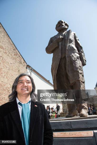 The Chinese artist Wu Weishan pictured in front of his sculpture of German philosopher and revolutionary Karl Marx after the inauguration at the...