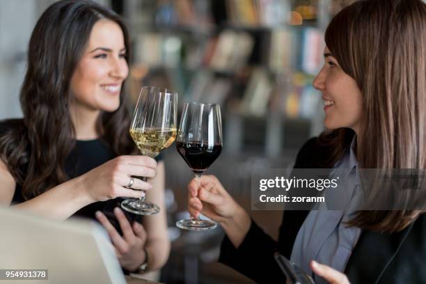 wine toast - glass half full party stock pictures, royalty-free photos & images