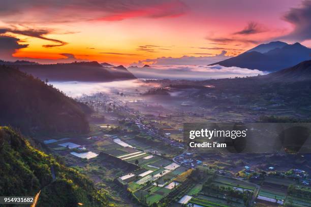 batur volcano sunrise, bali indonesia. batur volcano sunrise serenity, bali. batur sunrise, bali. bali sunrise serenity. dawn sky at morning in mountain. serenity of mountain landscape. - kintamani stock pictures, royalty-free photos & images