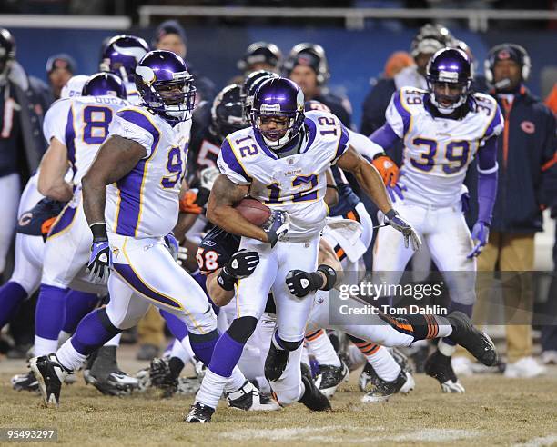 Percy Harvin of the Minnesota Vikings returns a kick during an NFL Monday night game against the Chicago Bears at Soldier Field, December 28, 2009 in...