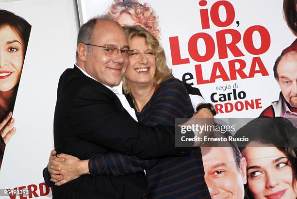 Director Carlo Verdone and actor Angela Finocchiaro attend the 'Io E Lara' photocall at Warner Moderno on December 30, 2009 in Rome, Italy.