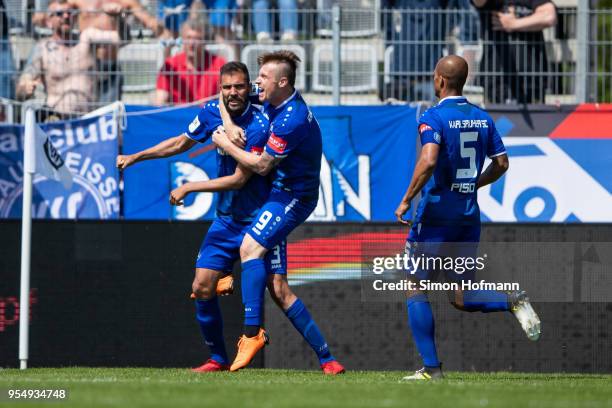 Daniel Gordon of Karlsruhe celebrates his team's second goal with team mate Marvin Pourie during the 3. Liga match between VfR Aalen and Karlsruher...