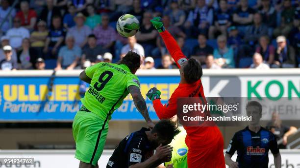 Michael Ratajczak of Paderborn challenges Manuel Schaeffler of Wehen Wiesbaden during the 3. Liga match between SC Paderborn 07 and SV Wehen...