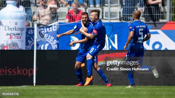 Daniel Gordon of Karlsruhe celebrates his team's second goal with team mate Marvin Pourie during the 3. Liga match between VfR Aalen and Karlsruher...