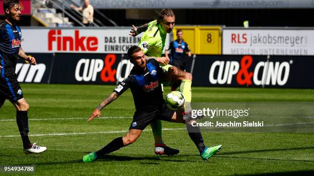 Robin Krausse of Paderborn challenges Manuel Schaeffler of Wehen Wiesbaden during the 3. Liga match between SC Paderborn 07 and SV Wehen Wiesbaden at...