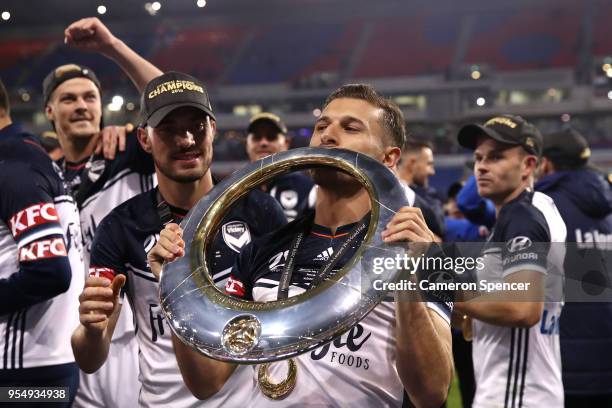 Kosta Barbarouses of the Victory celebrates winning the 2018 A-League Grand Final match between the Newcastle Jets and the Melbourne Victory at...