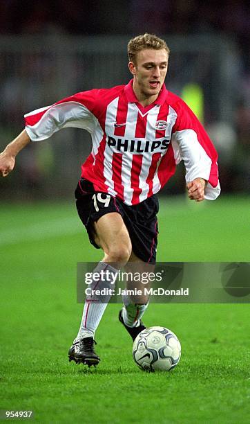 Dennis Rommedahl of PSV Eindhoven runs with the ball during the UEFA Cup Quarter Finals second leg match against Kaiserslautern played at the Philips...