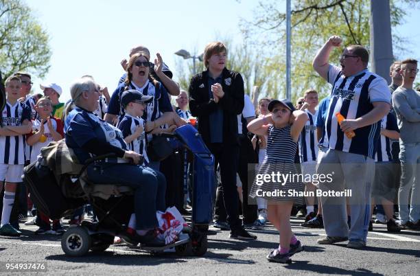 West Bromwich Albion fans celebrate a Crystal Palace goal whilst watching the Stoke City and Crystal Palace game ahead of the Premier League match...