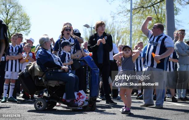 West Bromwich Albion fans celebrate a Crystal Palace goal whilst watching the Stoke City and Crystal Palace game ahead of the Premier League match...