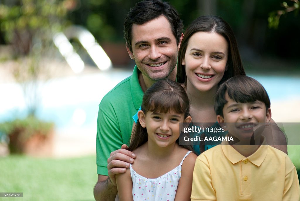 Family outdoors in backyard