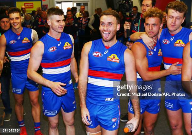 Hayden Crozier of the Bulldogs celebrates the win during the round seven AFL match between the Western Bulldogs and the Gold Coast Suns at Mars...