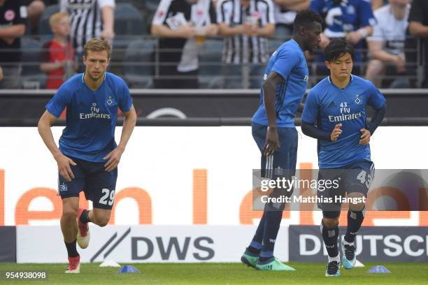 Matti Ville Steinmann, Bakery Jatta, Tatsuya Ito of Hamburg during warmup before the Bundesliga match between Eintracht Frankfurt and Hamburger SV at...