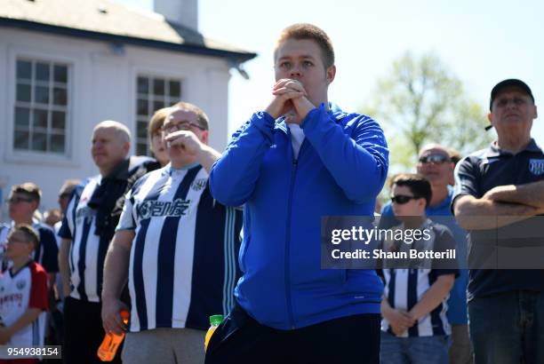 West Bromwich Albion fans watch the Stoke City and Crystal Palace game prior to the Premier League match between West Bromwich Albion and Tottenham...