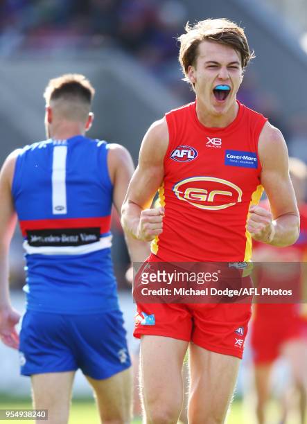 Charlie Ballard of the Suns celebrates a goal during the round seven AFL match between the Western Bulldogs and the Gold Coast Suns at Mars Stadium...