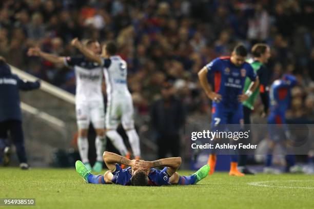 Jason Hoffman of the Jets is dejected after losing during the 2018 A-League Grand Final match between the Newcastle Jets and the Melbourne Victory at...