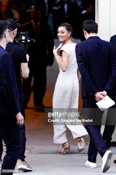 Phoebe Tonkin is seen, outside the Chanel Cruise 2018/2019 Collection, at Le Grand Palais on May 03, 2018 in Paris, France.