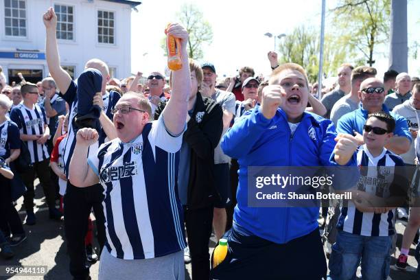 West Bromwich Albion fans watch the Stoke City and Crystal Palace game prior to the Premier League match between West Bromwich Albion and Tottenham...