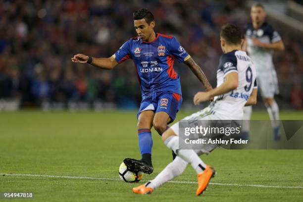 Ronald Vargas of the Jets is contested by Kosta Barbarouses of the Victory during the 2018 A-League Grand Final match between the Newcastle Jets and...