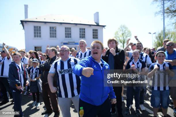 West Bromwich Albion fans celebrate Crystal Palace's second goal, as they watch the Stoke City and Crystal Palace game ahead of the Premier League...