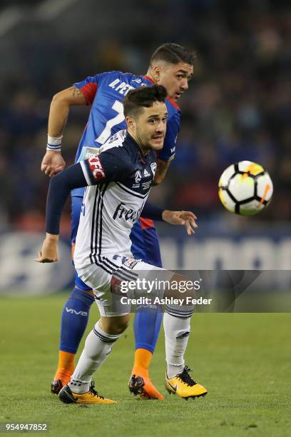 Stefan Nigro of the Victory is contested by Dimitri Petratos of the Jets during the 2018 A-League Grand Final match between the Newcastle Jets and...
