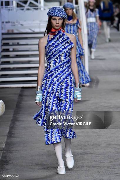 Model walks the runway during Chanel Cruise 2018/2019 Collection fashion show at Le Grand Palais on May 3, 2018 in Paris, France.