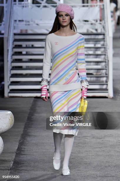 Model walks the runway during Chanel Cruise 2018/2019 Collection fashion show at Le Grand Palais on May 3, 2018 in Paris, France.