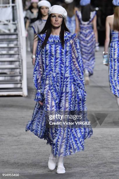 Model walks the runway during Chanel Cruise 2018/2019 Collection fashion show at Le Grand Palais on May 3, 2018 in Paris, France.