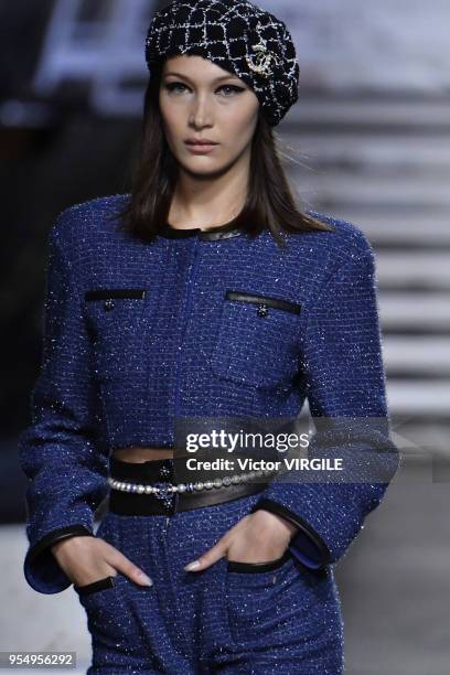 Bella Hadid walks the runway during Chanel Cruise 2018/2019 Collection fashion show at Le Grand Palais on May 3, 2018 in Paris, France.