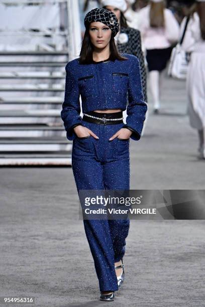 Bella Hadid walks the runway during Chanel Cruise 2018/2019 Collection fashion show at Le Grand Palais on May 3, 2018 in Paris, France.