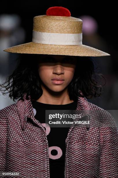 Model walks the runway during Chanel Cruise 2018/2019 Collection fashion show at Le Grand Palais on May 3, 2018 in Paris, France.