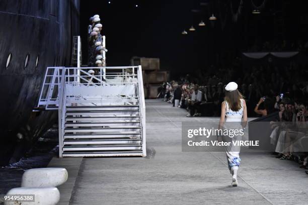 Model walks the runway during Chanel Cruise 2018/2019 Collection fashion show at Le Grand Palais on May 3, 2018 in Paris, France.