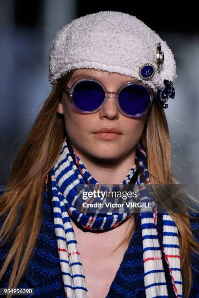 Model walks the runway during Chanel Cruise 2018/2019 Collection fashion show at Le Grand Palais on May 3, 2018 in Paris, France.