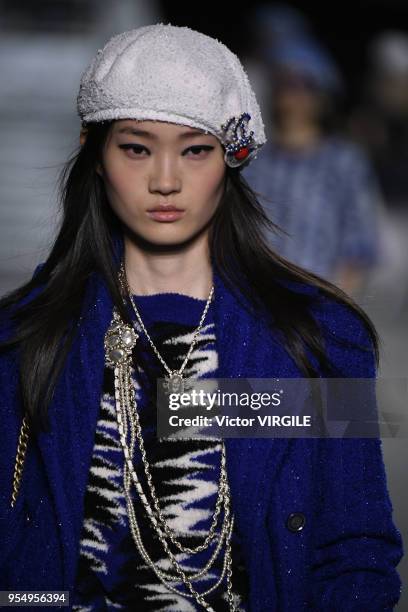 Model walks the runway during Chanel Cruise 2018/2019 Collection fashion show at Le Grand Palais on May 3, 2018 in Paris, France.