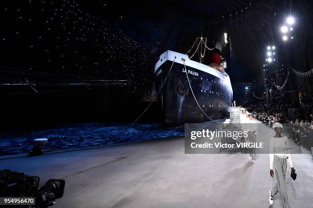 Model walks the runway during Chanel Cruise 2018/2019 Collection fashion show at Le Grand Palais on May 3, 2018 in Paris, France.