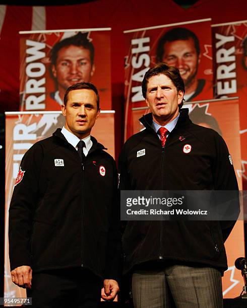 Steve Yzerman, Executive Director of Canada's 2010 Men's Olympic hockey team and Head Coach Mike Babcock pose for a photo during the unveilling of...