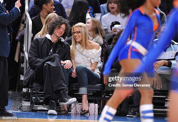 Howard Stern and Beth Ostrosky attend the Los Angeles Clippers vs New York Knicks game at Madison Square Garden on December 18, 2009 in New York City.