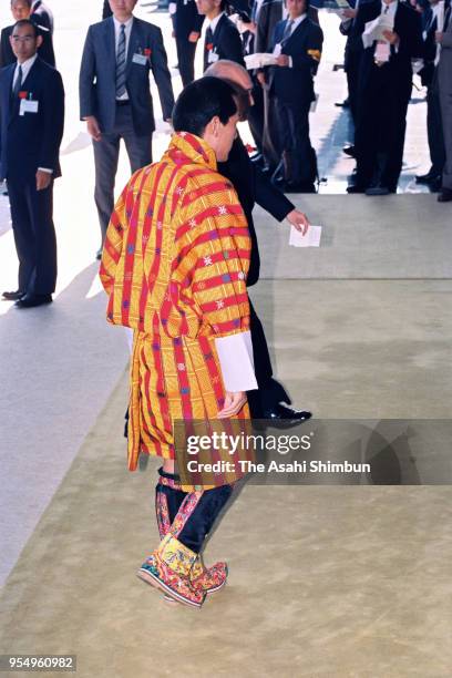 King Jigme Singye Wangchuck of Bhutan is seen on arrival at the Imperial Palace to attend the 'Sokui-no-Rei', Emperor's Enthronement Ceremony at the...