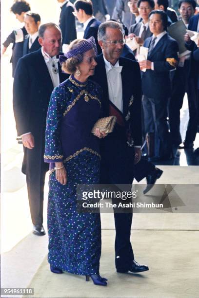 King Baudouin and Queen Fabiola of Belgium are seen on arrival at the Imperial Palace to attend the 'Sokui-no-Rei', Emperor's Enthronement Ceremony...