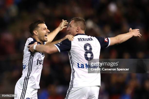 Kosta Barbarouses of the Victory and Besart Berisha of the Victory celebrate winning the 2018 A-League Grand Final match between the Newcastle Jets...