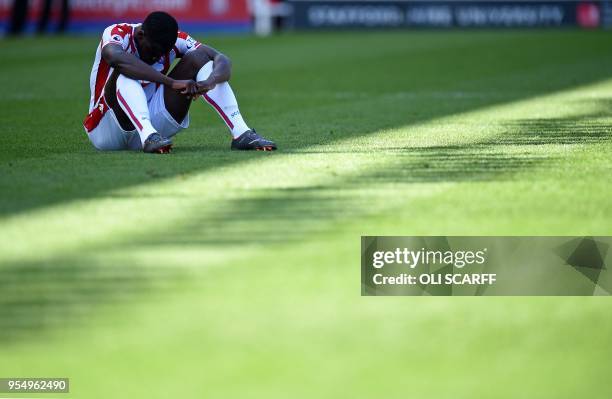 Stoke City's French defender Kurt Zouma reacts following during the English Premier League football match between Stoke City and Crystal Palace at...