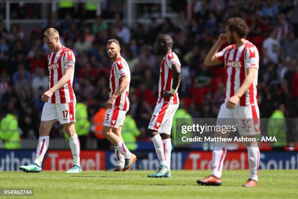 Dejected Ryan Shawcross,Erik Pieters,Stephen Ireland and Ramadan Sobhi of Stoke City after the 1-2 defeat during the Premier League match between...