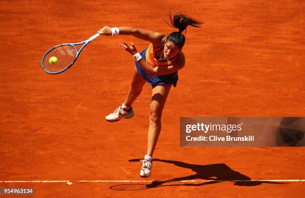 Lara Arruabarrena of Spain serves against Marta Kostyuk of the Ukraine in their first round match during day one of the Mutua Madrid Open tennis...