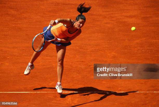 Lara Arruabarrena of Spain serves against Marta Kostyuk of the Ukraine in their first round match during day one of the Mutua Madrid Open tennis...