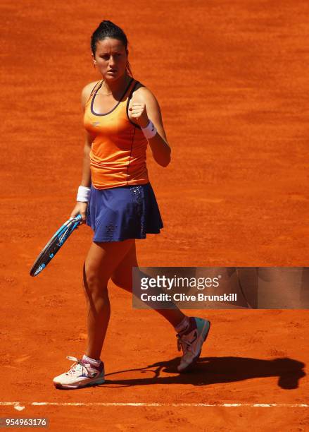 Lara Arruabarrena of Spain celebrates a point against Marta Kostyuk of the Ukraine in their first round match during day one of the Mutua Madrid Open...