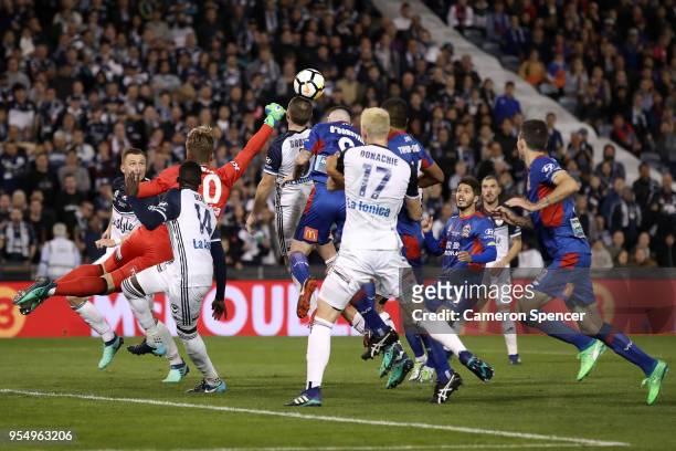 Lawrence Thomas of the Victory clears the ball during the 2018 A-League Grand Final match between the Newcastle Jets and the Melbourne Victory at...