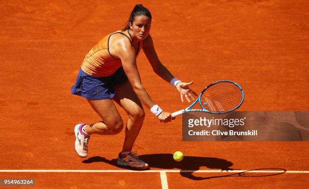 Lara Arruabarrena of Spain plays a backhand volley against Marta Kostyuk of the Ukraine in their first round match during day one of the Mutua Madrid...