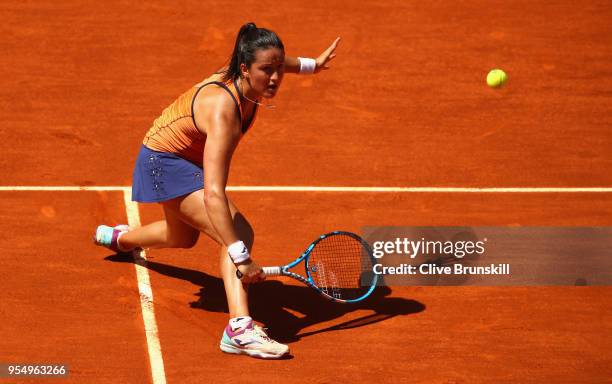 Lara Arruabarrena of Spain plays a backhand volley against Marta Kostyuk of the Ukraine in their first round match during day one of the Mutua Madrid...