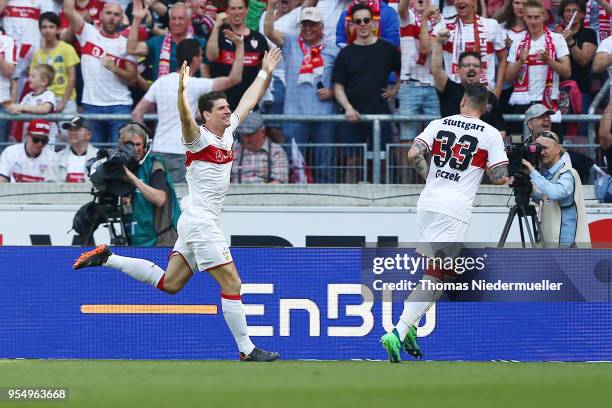 Mario Gomez of Stuttgart celebrates his goal with Daniel Ginczek during the Bundesliga match between VfB Stuttgart and TSG 1899 Hoffenheim at...