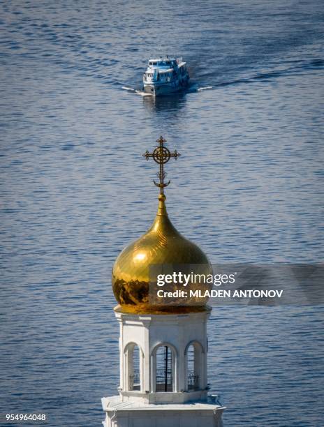 Boat traverses the Volga river near Samara on May 5, 2018. - Samara will host several matches of the 2018 FIFA World Cup football tournament.